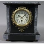 A reproduction mantel clock in Victorian style with grey and black slate case,