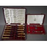 A set of six antler handled steak knives and forks, retailed by J R Ogden and Sons Limited,