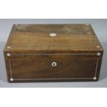 A Victorian rosewood veneered box inlaid with mother of pearl circlets to the corners and string
