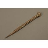 A Victorian telescopic pencil and pen in gold shelled barrel,