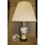 A reproduction Chinese style baluster table lamp and umbrella tile