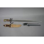 A World War I bayonet, another bayonet inscribed number four mark two, and numbered 3EF567,