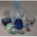 Five glass paperweights, two art glass bowls,