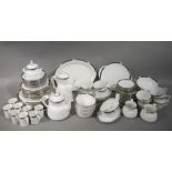 An extensive Royal Doulton Vogue Collection Enchantment pattern breakfast service;