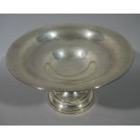 A silver pedestal dish on circular stepped and weighted base, Birmingham 1912, 20cm diameter x 11.