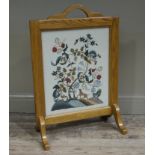 An elm framed fire screen with needlework inset depicting hound,