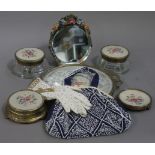 A small Barbola mirror with bevelled plate,