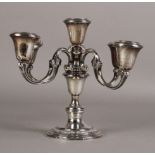 An American Gorham silver five light candelabra with four scrolled arms,