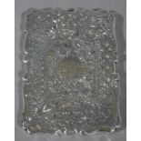 A Victorian silver card case of rectangular bracketed outline,