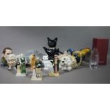 A quantity of novelty teapots, ceramic figurines,