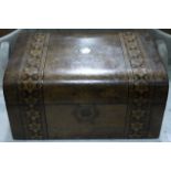 A Victorian burr walnut veneered dome topped box inlaid with parquetry bands the hinged lid and