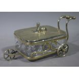 A silver plated sardine or butter dish of rounded rectangular form the lid with Sphinx finial and