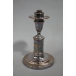 A Victorian silver plated candle stand in neo classic style,
