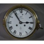 A Schatz Royal Mariner clock the white enamel dial with Roman numerals,