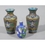 A pair of Chinese cloisonné vases, 9cm high together with a small cloisonné scent bottle,