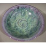 D Fry - a studio pottery bowl moulded to the centre with a circular swirl,