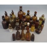 Eight brown glass pharmacy bottles,