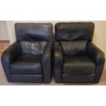 A pair of Connolly navy blue leather armchairs