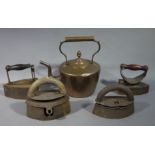 Four flat irons and a Victorian copper kettle