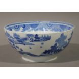 A Selopian blue and white bowl transfer printed with pagodas and bridged landscapes within formal