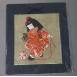 A Japanese fabric collage of a young girl in traditional costume,