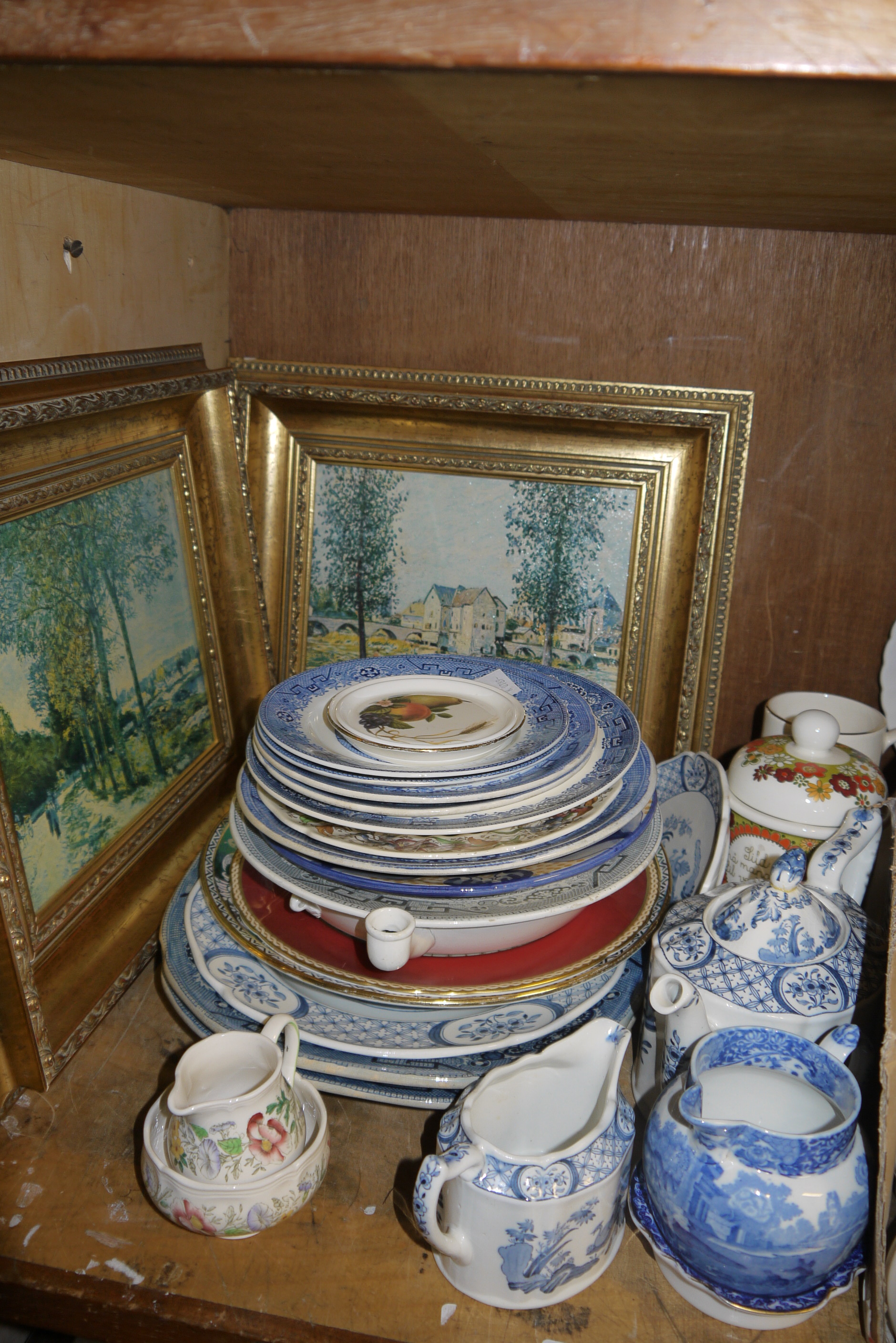 A quantity of miscellaneous blue and white china, pair of gilt framed prints,