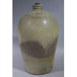 A late 19th century stoneware wine flagon lettered for 'T & E Booth Wine & Spirit Merchants,