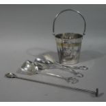 A silver plated ice pail with swing handle together with an ice scoop,