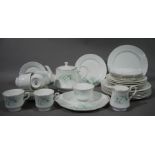 A Royal Stafford china tea and dinner service of floral decoration on a white ground comprising six