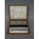 A set of six silver coffee spoons in case London 1943