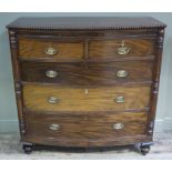 A 19th century mahogany bow fronted chest of drawers with split bead edge,