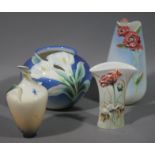 A Franz porcelain vase relief moulded with poppies to the shaded blue to yellow body,