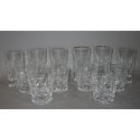 A set of six tall cut glass tumblers;