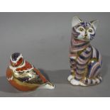 Two Royal Crown Derby paperweights in the form of a cat, and of a bird,