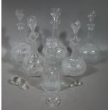 Six decanters and stoppers;
