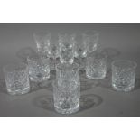 A set of six small cut glass whisky tumblers;