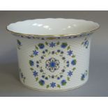 A large Herend circular basket moulded jardiniere with spreading neck painted with flowerheads and