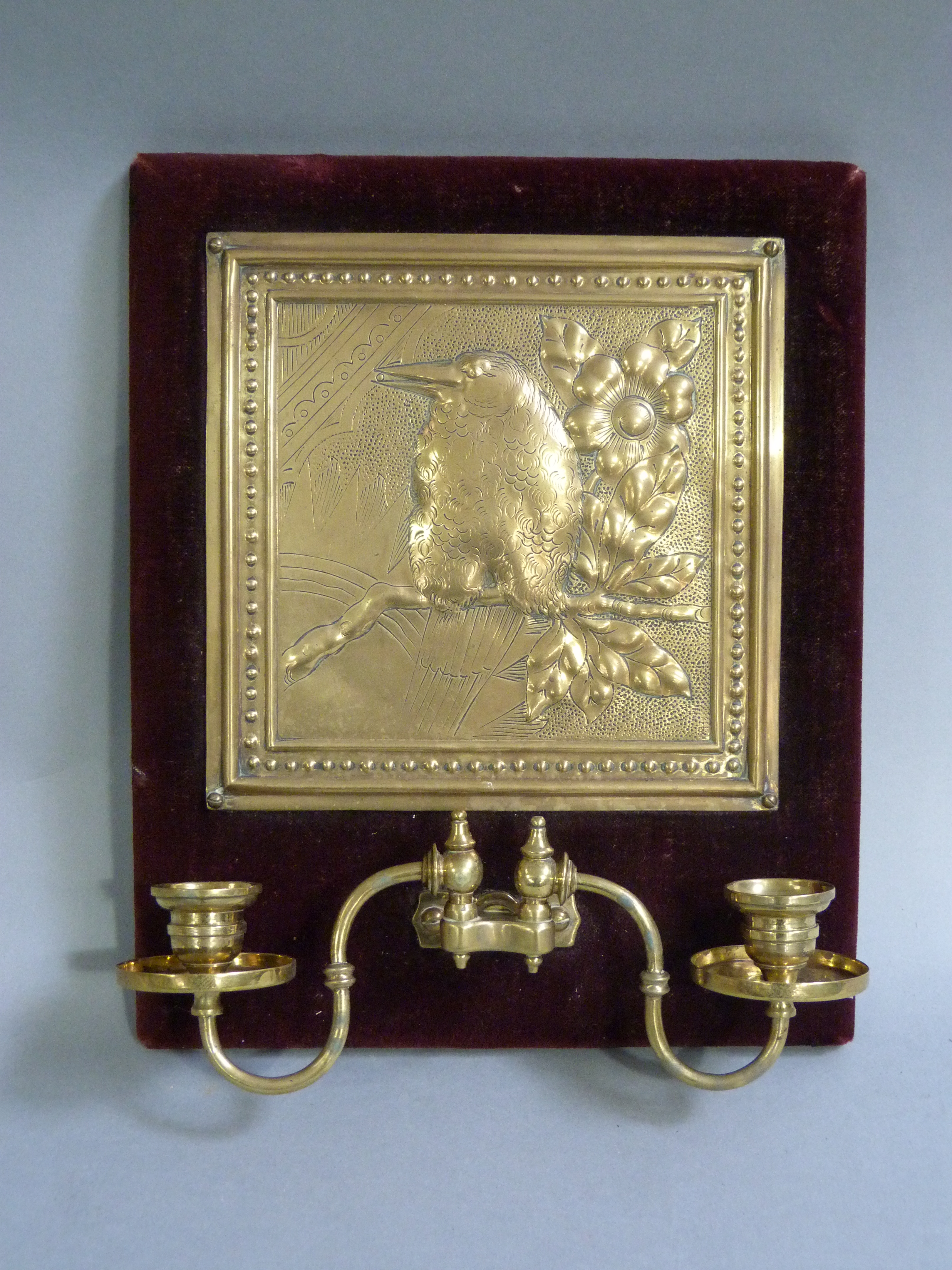 19th century brass mounted twin bracket wall sconce with Martin Brothers style grotesque bird