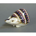 A Royal Crown Derby paperweight modelled as a hedgehog, unmarked lacking plug, 10.