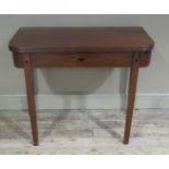 A George III mahogany tea table,