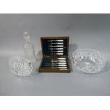 A boxed set of six mother-of-pearl handled silver plated fruit knives and forks together with a