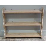 A set of pine shelves, shaped sides,