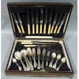 A quantity of silver plated table cutlery contained within an oak box