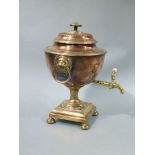 A post Regency copper and brass samovar of conventional form with shallow lid with disc finial,