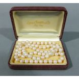 A necklace of 7mm cultured pearls,