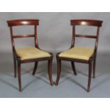 A pair of Regency mahogany single chairs, broad top rail, plain tie rail,