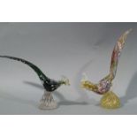 Two Murano glass cockerels one green the other multicoloured on a gilt swirl base,