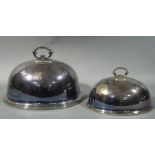 Two silver plated meat dish covers with beaded handles one initialed B, beaded borders,