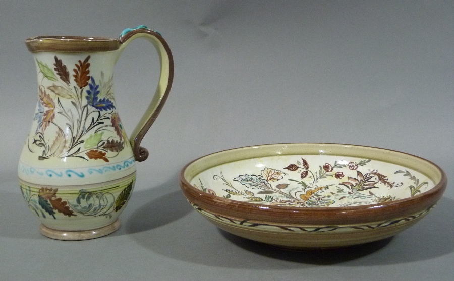 A Bourne Denby baluster jug and similar circular bowl each piece decorated with stylised leafage