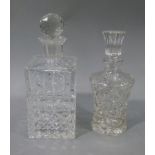 A cut glass whisky decanter and another decanter (2)